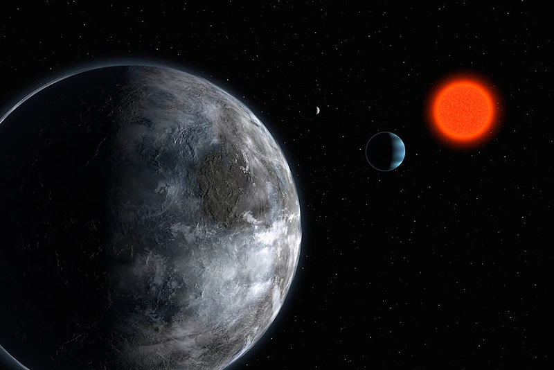 IN SPACE - APRIL 25: In this artist's impression supplied by the ESO (European Southern Observatory) on April 25, 2007, the planetary system around the red dwarf, Gliese 581, is pictured showing what astronomers believe is the most earth like planet found outside our solar system to date. Using the ESO 3.6-m telescope in Chile, astronomers have uncovered the planet which could have water running on its surface. The planet orbits the faint star Gliese 581, which is 20.5 light-years away in the constellation Libra. (Photo by ESO via Getty Images) *** Local Caption ***
