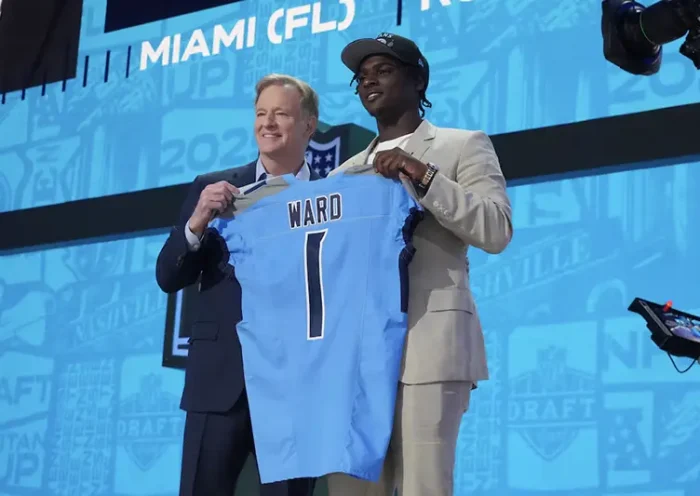 NFL commissioner Roger Goodell stands with Miami Hurricanes quarterback Cameron Ward after he is selected by the Tennessee Titans as the number one pick in the first round of the 2025 NFL Draft at Lambeau Field. Mandatory Credit: Kirby Lee-Imagn Images