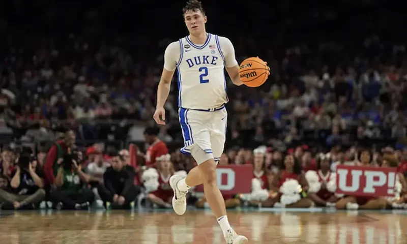 Duke Blue Devils forward Cooper Flagg (2) dribbles the ball against the Houston Cougars during the second half in the semifinals of the men's Final Four of the 2025 NCAA Tournament at the Alamodome. Mandatory Credit: Bob Donnan-Imagn Images/ File Photo