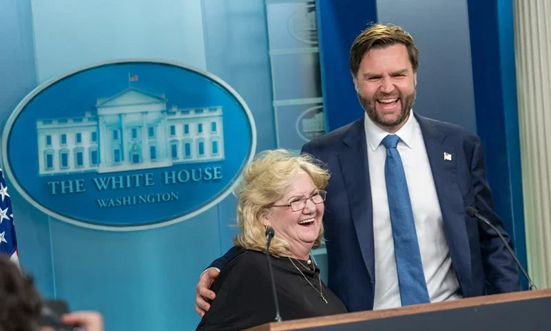 Vice President JD Vance laughs with his mother, Beverly Aikins, at the podium in the White House press briefing room in Washington, D.C. | Emily Higgins/Provided by The White House