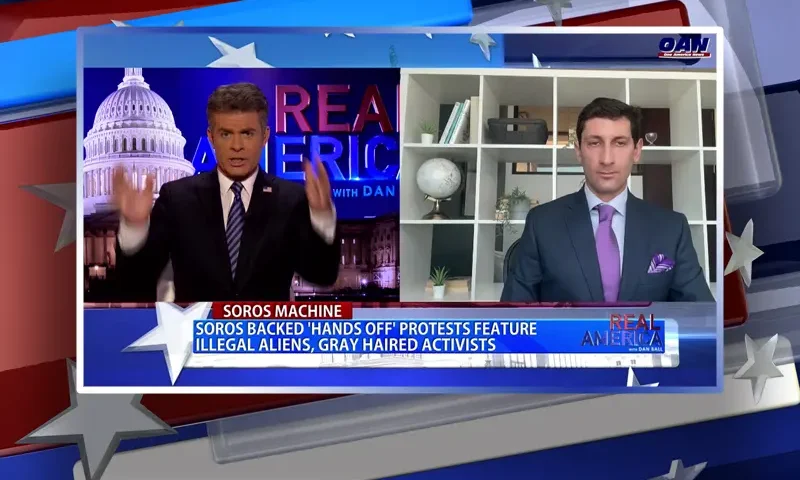 Video still from Real America on One America News Network showing a split screen of the host on the left side, and on the right side is the guest, Adam Swart.