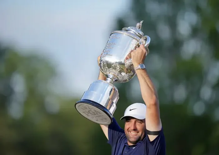 Scottie Scheffler holds up his trophy after winning the PGA Championship golf tournament at Quail Hollow. Mandatory Credit: Jim Dedmon-Imagn Images