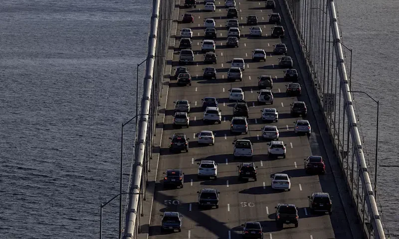 A view of cars on the road during rush hour traffic jam, while California's government authorities are expected to put into effect a plan to prohibit the sale of new gasoline-powered cars by 2035, according to local media, in San Francisco, California, U.S. August 24, 2022. REUTERS/Carlos Barria/File Photo