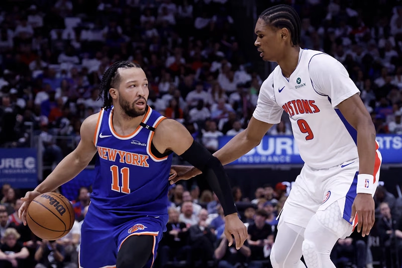 New York Knicks guard Jalen Brunson (11) is defended by Detroit Pistons forward Ausar Thompson (9) in the first half during game six of first round for the 2024 NBA Playoffs at Little Caesars Arena. Mandatory Credit: Rick Osentoski-Imagn Images