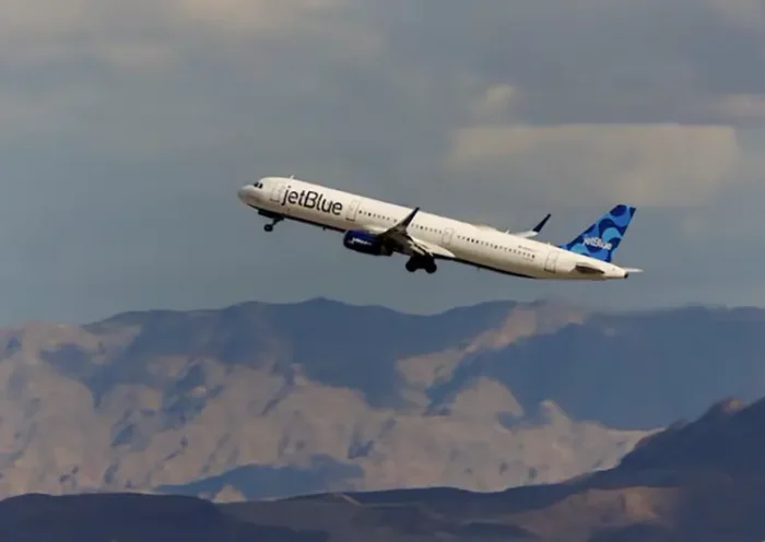 A Jetblue commercial airliner takes off form Las Vegas International Airport in Las Vegas, Nevada, U.S., February 8, 2024. REUTERS/Mike Blake/File Photo
