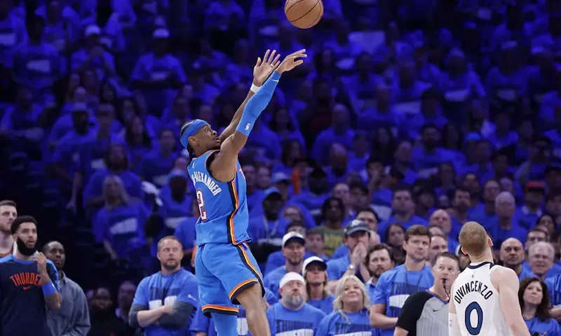 Oklahoma City Thunder guard Shai Gilgeous-Alexander (2) shoots in the third quarter against the Minnesota Timberwolves during game two of the western conference finals for the 2025 NBA Playoffs at Paycom Center. Mandatory Credit: Alonzo Adams-Imagn Images