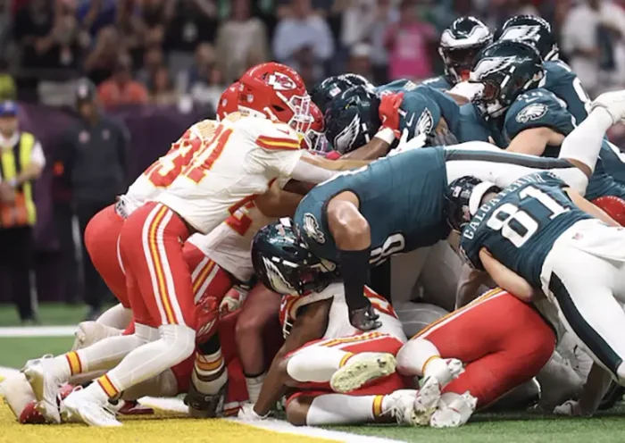 Philadelphia Eagles quarterback Jalen Hurts (1) scores a touchdown against the Kansas City Chiefs in the first quarter in Super Bowl LIX at Ceasars Superdome. Mandatory Credit: Mark J. Rebilas-Imagn Images