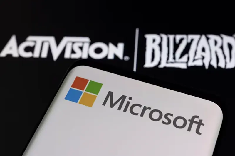 Microsoft logo is seen on a smartphone placed on displayed Activision Blizzard logo in this illustration taken January 18, 2022. REUTERS/Dado Ruvic/Illustration/File Photo