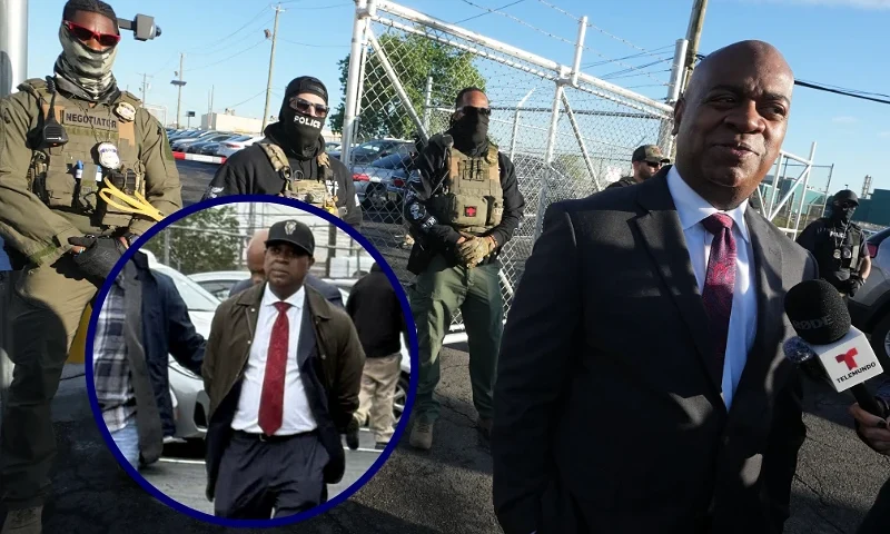 (Background) Mayor Ras Baraka of Newark speaks to the press near ICE agents at a demonstration outside an immigrant detention centre in Elizabeth, New Jersey May 7, 2025. The Mayor arrived at the gates of Delaney Hall to inspect the previously vacant prison that is being converted into an immigrant detention center. Delaney Hall has the ability to hold over a 1000 people, and the detention facility, privately owned by The GEO Group, holds a contract with the federal government to house people arrested by ICE. (Photo by TIMOTHY A. CLARY / AFP) (Photo by TIMOTHY A. CLARY/AFP via Getty Images) / (Front) Newark Mayor Ras Baraka being taken into custody by federal agents at Delaney Hall, an immigrant jail in Newark, on May 9, 2025. (Photo via: Rep. Bonnie Watson Coleman)