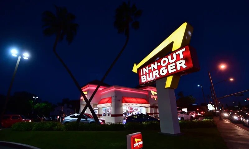 Drivers wait in the drive-thru line at an In-N-Out Burger restaurant in Alhambra, California, on August 30, 2018. - California's Democratic Party Chairman, Eric Bauman, is calling for a boycott of the Irvine, CA based fast food chain after it donated $25,000 to help California Republicans in November. In addition to this week's donation, In-N-Out donated $30,000 to the GOP in 2017 and 2016. (Photo by Frederic J. BROWN / AFP) (Photo by FREDERIC J. BROWN/AFP via Getty Images)
