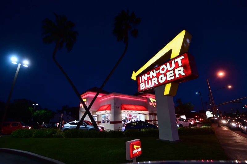 Drivers wait in the drive-thru line at an In-N-Out Burger restaurant in Alhambra, California, on August 30, 2018. - California's Democratic Party Chairman, Eric Bauman, is calling for a boycott of the Irvine, CA based fast food chain after it donated $25,000 to help California Republicans in November. In addition to this week's donation, In-N-Out donated $30,000 to the GOP in 2017 and 2016. (Photo by Frederic J. BROWN / AFP) (Photo by FREDERIC J. BROWN/AFP via Getty Images)