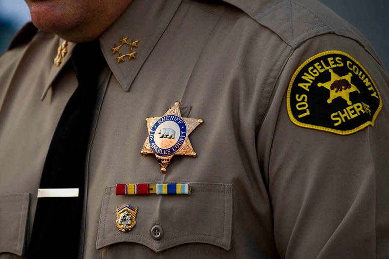 Sheriff Alex Villanueva of the Los Angeles Sheriff's Department (LASD) speaks about a task force targeting wage theft outside of the Hall of Justice on February 9, 2021 in Los Angeles, California. (Photo by Patrick T. FALLON / AFP) (Photo by PATRICK T. FALLON/AFP via Getty Images)