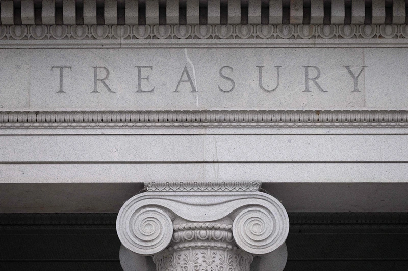 The US Treasury Department building is seen in Washington, DC, January 19, 2023, following an announcement by the US Treasury that it had begun taking measures Thursday to prevent a default on government debt, as Congress heads towards a high-stakes clash between Democrats and Republicans over raising the borrowing limit. - The world's biggest economy could face severe disruption with Republicans threatening to refuse the usual annual rubber stamping of a rise in the legal borrowing limit, and this could push the United States into default. (Photo by SAUL LOEB / AFP) (Photo by SAUL LOEB/AFP via Getty Images)