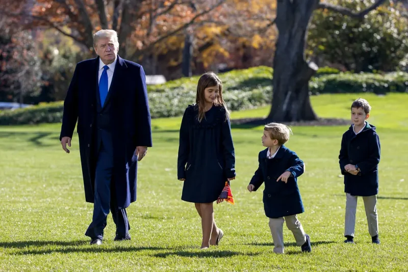 WASHINGTON, DC - NOVEMBER 29: U.S. President Donald Trump, followed by his grandchildren, Arabella Kushner, Theodore Kushner, and Joseph Kushner walk on the south lawn of the White House on November 29, 2020 in Washington, DC. President Trump spent the weekend at Camp David and at Trump National Golf Club in Sterling, Virginia. (Photo by Tasos Katopodis/Getty Images)