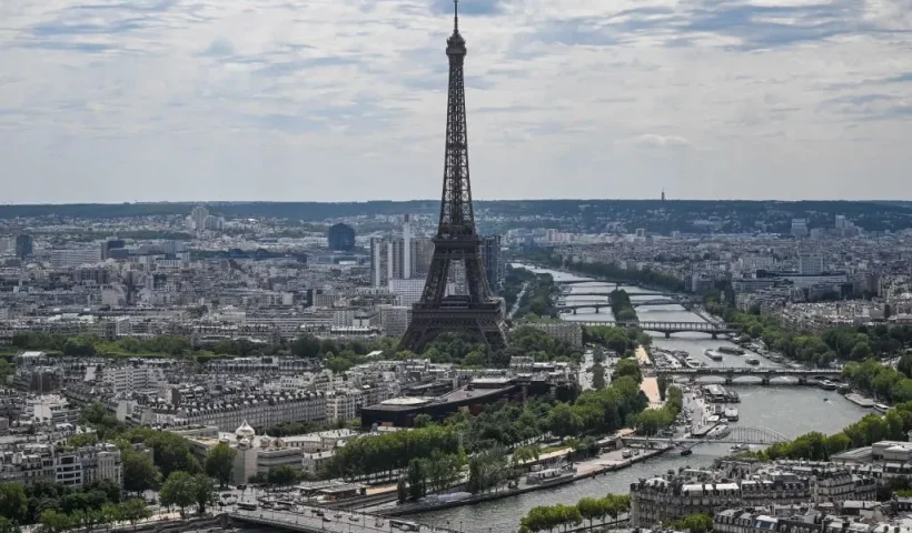 This photograph taken onboard a helicopter shows a view of the Seine river and the Eiffel Tower during a rehearsal, three days ahead of the Bastille Day parade, in Paris on July 11, 2023. (Photo by Emmanuel DUNAND / AFP) (Photo by EMMANUEL DUNAND/AFP via Getty Images)