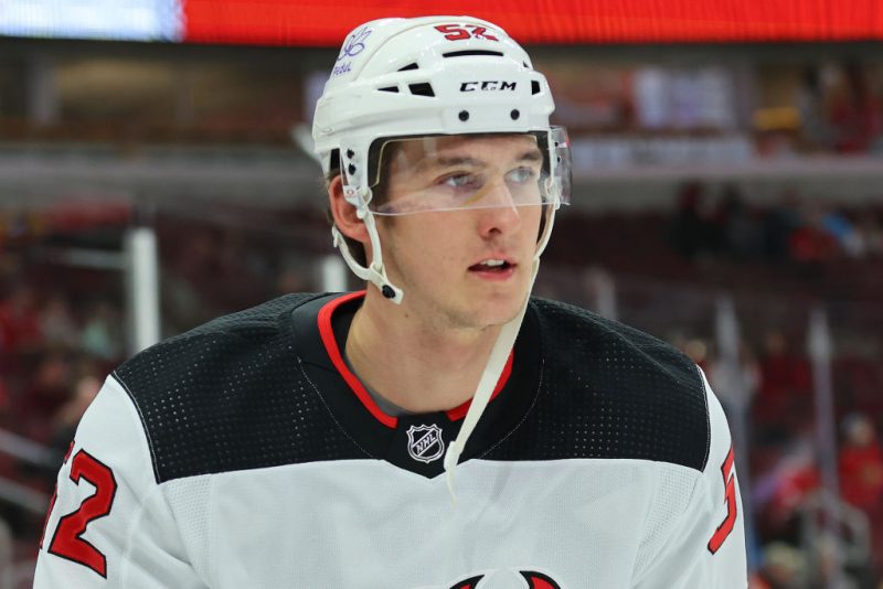 CHICAGO, ILLINOIS - NOVEMBER 05: Cal Foote #52 of the New Jersey Devils looks on prior to the game against the Chicago Blackhawks at the United Center on November 05, 2023 in Chicago, Illinois. (Photo by Michael Reaves/Getty Images)