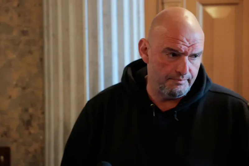 WASHINGTON, DC - MARCH 13: U.S. Sen. John Fetterman (D-PA) speaks to reporters outside of the Senate Chambers at the U.S. Capitol on March 13, 2025 in Washington, DC. On Wednesday Senate Democrats, not in line with the continuing resolution passed by House Republicans providing a six-month funding extension to avert a government shutdown, proposed an alternate plan that would fund the government in the short term through April 11. (Photo by Anna Moneymaker/Getty Images)