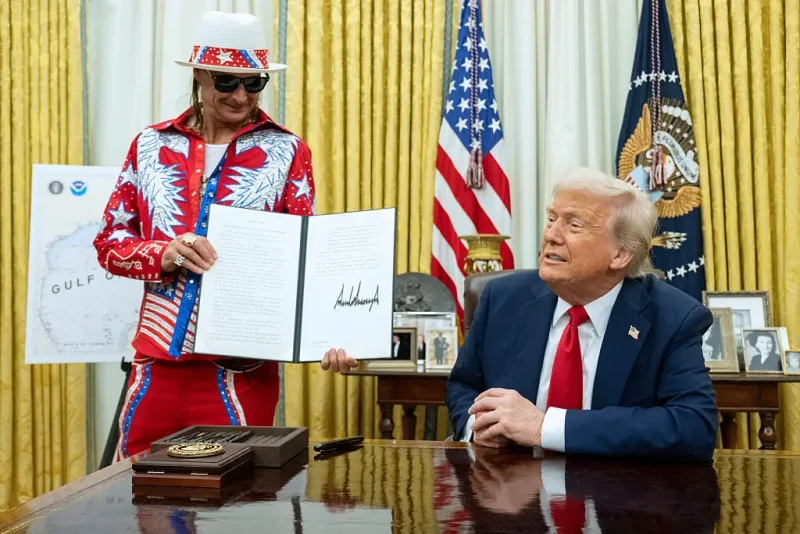 US singer Kid Rock holds an executive order signed by US President Donald Trump in the Oval Office of the White House in Washington, DC, on March 31, 2025. (Photo by SAUL LOEB / AFP) (Photo by SAUL LOEB/AFP via Getty Images)