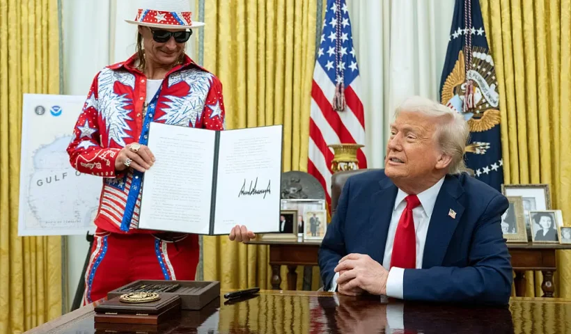 US singer Kid Rock holds an executive order signed by US President Donald Trump in the Oval Office of the White House in Washington, DC, on March 31, 2025. (Photo by SAUL LOEB / AFP) (Photo by SAUL LOEB/AFP via Getty Images)