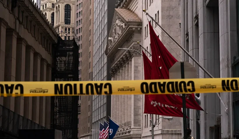 NEW YORK, NEW YORK - APRIL 15: A view of the New York Stock Exchange behind caution tape before morning trading on April 15, 2025 in New York City. U.S. stocks climbed early Tuesday as investors weighed recent updates on President Trump's tariffs, including a possible reprieve for the auto industry and a definitive move toward new duties on semiconductors and pharmaceuticals. (Photo by Adam Gray/Getty Images)