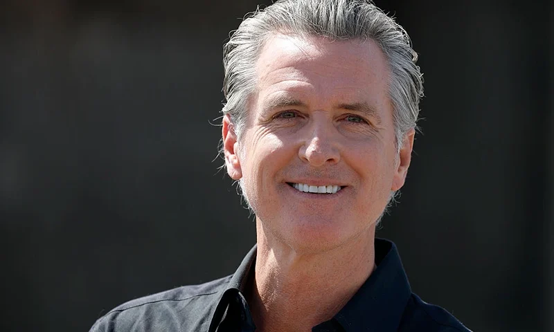 CERES, CALIFORNIA - APRIL 16: California Governor Gavin Newsom speaks during a news conference at Gemperle Orchard on April 16, 2025 in Ceres, California. Governor Gavin Newsom and California Attorney General Rob Bonta have filed a lawsuit in federal court challenging the Trump administration's use of emergency powers to enact sweeping tariffs that hurt states, consumers, and businesses. The tariffs have disrupted supply chains, increased costs for the state and Californians, and inflicted billions in damages on California’s economy, the fifth largest in the world. (Photo by Justin Sullivan/Getty Images)