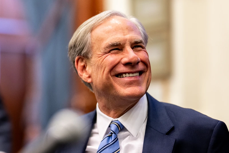 AUSTIN, TEXAS - APRIL 23: Gov. Greg Abbott laughs upon arrival during a bill signing in the State Capitol on April 23, 2025 in Austin, Texas. Senate Bill 14 introduces and establishes a new Texas Regulatory Efficiency Office which seeks to create better practices within state agencies and terminate unnecessary regulations. (Photo by Brandon Bell/Getty Images)