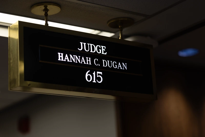A sign hangs above the courtroom of Milwaukee County Circuit Judge Hannah Dugan in the Milwaukee County Courthouse on April 25, 2025 in Milwaukee, Wisconsin. Judge Dugan was arrested by the FBI after arriving at work this morning and charged in federal court for allegedly helping an undocumented immigrant avoid arrest. (Photo by Scott Olson/Getty Images)