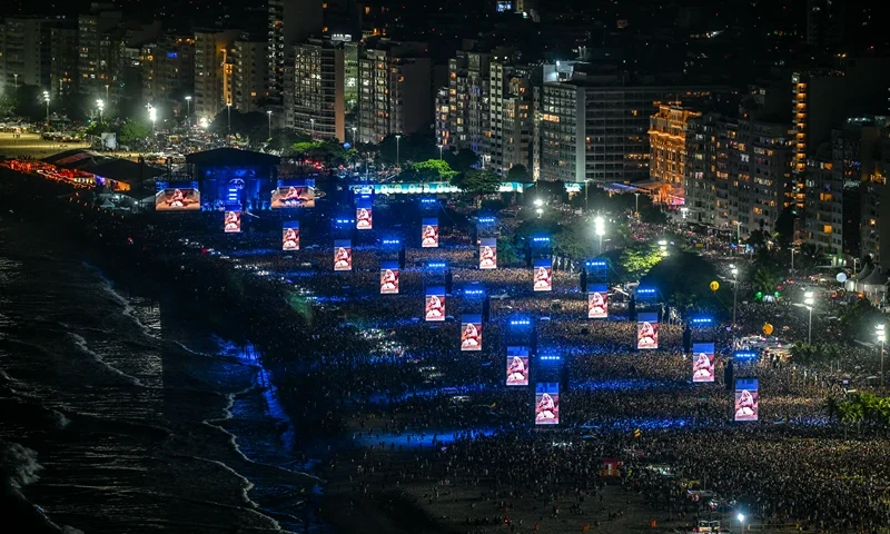 US pop star Lady Gaga is projected on big screens as she performs during her concert at Copacabana beach in Rio de Janeiro, Brazil on May 3, 2025. (Photo by Mauro PIMENTEL / AFP) (Photo by MAURO PIMENTEL/AFP via Getty Images)