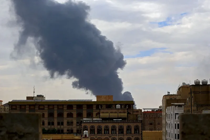 Smoke rises on the horizon after an Israeli air strike on Yemen's Huthi-controlled capital, Sanaa, on May 6, 2025. Israeli air raids targeted Yemen's main airport and essential power facilities in the Sanaa area, as confirmed by Huthi media and the Israeli military, in retaliation for a missile attack by the Iran-backed rebels. (Photo by Mohammed HUWAIS / AFP) (Photo by MOHAMMED HUWAIS/AFP via Getty Images)