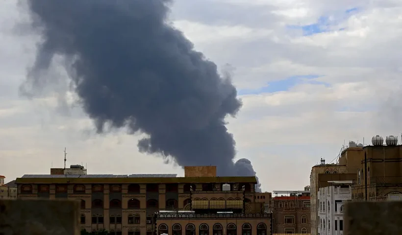 Smoke billows on the horizon following an Israeli air strike on Yemen's Huthi-held capital Sanaa on May 6, 2025. Israeli air raids struck Yemen's main airport and power stations in the Sanaa area on May 6, Huthi media and Israel's military said, the latest retaliation for a missile attack by the Iran-backed rebels. (Photo by Mohammed HUWAIS / AFP) (Photo by MOHAMMED HUWAIS/AFP via Getty Images)