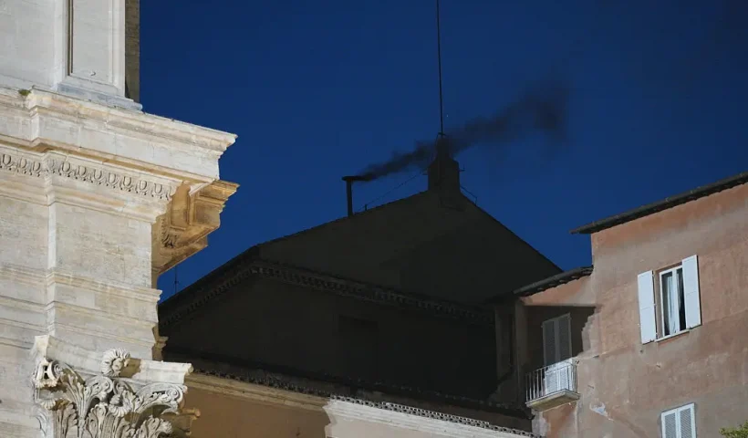 VATICAN CITY, VATICAN - MAY 7: Black smoke is seen from the chimney of the Sistine Chapel meaning a new pope is not yet elected and voting will continue tomorrow on May 7, 2025 in Vatican City, Vatican. Cardinals of the Catholic Church have descended on Vatican City to commence the papal conclave, the secretive voting process held in the Sistine Chapel that requires a two-thirds majority to elect the new leader of the Catholic Church. The election follows the death of Pope Francis on April 21 at the age of 88. (Photo by Christopher Furlong/Getty Images)