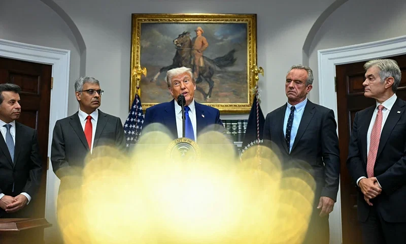 US President Donald Trump (C), alongside (L-R) FDA Commissioner Marty Makary, National Institute of Health (NIH) Director Jayanta Bhattacharya, Secretary of Health and Human Services Robert F. Kennedy Jr and Administrator for the Centers for Medicare and Medicaid Services Mehmet Oz, speaks during a news conference about prescription drug prices, in the Roosevelt Room of the White House on May 12, 2025, in Washington, DC. (Photo by Jim WATSON / AFP) (Photo by JIM WATSON/AFP via Getty Images)