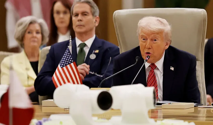 RIYADH, SAUDI ARABIA - MAY 14: U.S. President Donald Trump speaks during the Gulf Cooperation Council (GCC) Leaders’ Summit at The Ritz-Carlton on May 14, 2025 in Riyadh, Saudi Arabia. U.S. Treasury Secretary Scott Bessent and White House Chief of Staff Susie Wiles appear on the left. The council addresses regional stability, defense cooperation, and energy policy among Gulf nations. Trump is on a multi-nation tour of the Gulf region focused on expanding economic ties and reinforcing security cooperation with key U.S. allies. (Photo by Win McNamee/Getty Images)