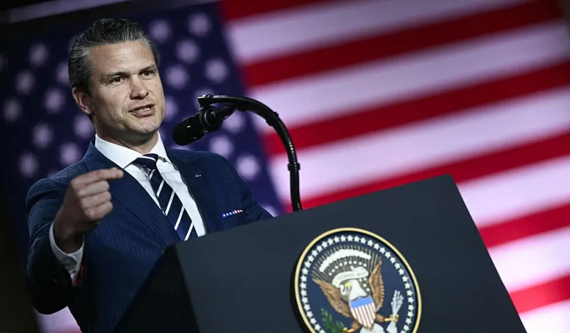 US Secretary of Defense Pete Hegseth addresses troops at the Al-Udeid air base southwest of Doha on May 15, 2025. (Photo by Brendan SMIALOWSKI / AFP) (Photo by BRENDAN SMIALOWSKI/AFP via Getty Images)