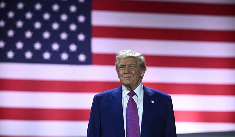 US President Donald Trump arrives to address troops at the Al-Udeid air base southwest of Doha on May 15, 2025. (Photo by Brendan SMIALOWSKI / AFP) (Photo by BRENDAN SMIALOWSKI/AFP via Getty Images)