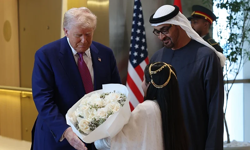 ABU DHABI, UNITED ARAB EMIRATES - MAY 15: U.S. President Donald J. Trump is greeted by UAE President Sheikh Mohamed bin Zayed Al Nahyan upon his arrival on May 15, 2025 in Abu Dhabi, United Arab Emirates. Trump is on the third day of his visit to the Gulf to underscore the strategic partnership between the United States and regional allies including the UAE, focusing on security and economic collaboration. (Photo by Win McNamee/Getty Images)