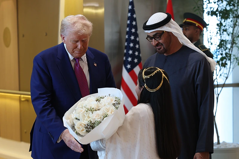 ABU DHABI, UNITED ARAB EMIRATES - MAY 15: U.S. President Donald J. Trump is greeted by UAE President Sheikh Mohamed bin Zayed Al Nahyan upon his arrival on May 15, 2025 in Abu Dhabi, United Arab Emirates. Trump is on the third day of his visit to the Gulf to underscore the strategic partnership between the United States and regional allies including the UAE, focusing on security and economic collaboration. (Photo by Win McNamee/Getty Images)