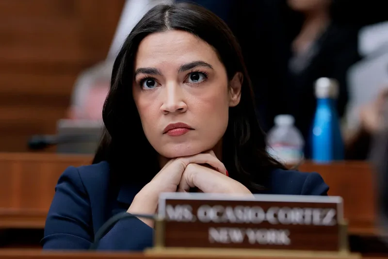 WASHINGTON, DC - MAY 13: Rep. Alexandria Ocasio-Cortez (D-NY) listens during a mark up meeting with the House Committee on Energy and Commerce committee on Capitol Hill on May 13, 2025 in Washington, DC. The committee met to discuss legislative recommendations for budget reconciliation. The committee room was surrounded by protesters fearing cuts or increased costs to medicaid. (Photo by Anna Moneymaker/Getty Images)