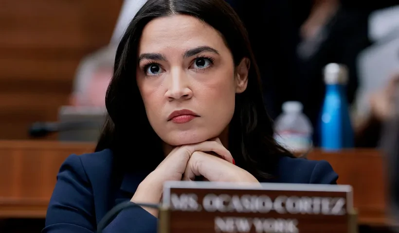WASHINGTON, DC - MAY 13: Rep. Alexandria Ocasio-Cortez (D-NY) listens during a mark up meeting with the House Committee on Energy and Commerce committee on Capitol Hill on May 13, 2025 in Washington, DC. The committee met to discuss legislative recommendations for budget reconciliation. The committee room was surrounded by protesters fearing cuts or increased costs to medicaid. (Photo by Anna Moneymaker/Getty Images)