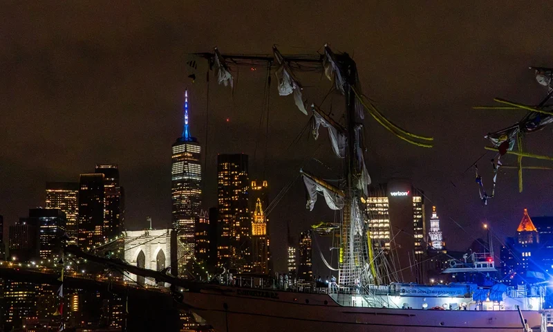 Emergency personnel respond after the Mexican Navy's tall ship Cuauhtemoc collided with the Brooklyn Bridge in New York City on May 17, 2025. The ship, which had been docked as part of a goodwill tour, struck the underside of the bridge while departing, injuring dozens. Rescue operations were launched as crew members evacuated and emergency boats arrived on scene. (Photo by Madison Swart / Hans Lucas / Hans Lucas via AFP) (Photo by MADISON SWART/Hans Lucas/AFP via Getty Images)
