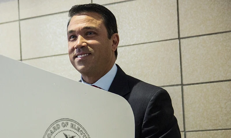 New York Rep. Michael Grimm (R-Staten Island/Brooklyn) fills out his ballot at a voting station on November 4, 2014 in the Staten Island borough of New York City. Grimm is facing a 20-count federal indictment relating to alleged illegal fundraising. Voters across the nation are going to the polls today to vote in various political races at the local, state and national level. (Photo by Andrew Burton/Getty Images)
