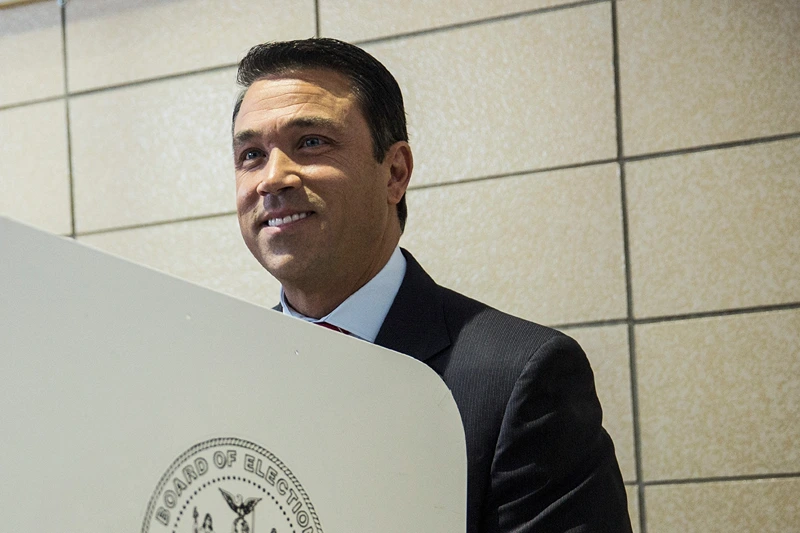New York Rep. Michael Grimm (R-Staten Island/Brooklyn) fills out his ballot at a voting station on November 4, 2014 in the Staten Island borough of New York City. Grimm is facing a 20-count federal indictment relating to alleged illegal fundraising. Voters across the nation are going to the polls today to vote in various political races at the local, state and national level. (Photo by Andrew Burton/Getty Images)