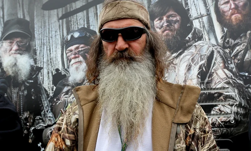 FORT WORTH, TX - APRIL 05: Reality TV personality Phil Robertson greets fans in the Duck Commander Compound at Texas Motor Speedway on April 5, 2014 in Fort Worth, Texas. (Photo by Jerry Markland/Getty Images for Texas Motor Speedway)