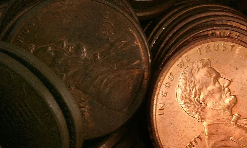DES PLAINES, IL - JULY 06: Pennies lay in a pile July 6, 2006 in Des Plaines, Illinois. According to the U.S. Mint says a penny costs more to make than it's worth, 1.2 cents, prompting some to call for its demise. (Photo Illustration by Tim Boyle/Getty Images)