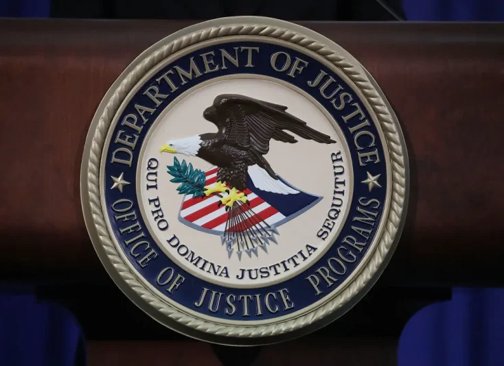 WASHINGTON, DC - JUNE 29: The Justice Department seal is seen on the lectern during a Hate Crimes Subcommittee summit on June 29, 2017 in Washington, DC. The meeting gave stakeholders the opportunity to offer imput to the committee before it makes its recommendations to the attorney general on what the Department of Justice can do to improve reporting, investigation and prosecution of hate crimes. (Photo by Mark Wilson/Getty Images)