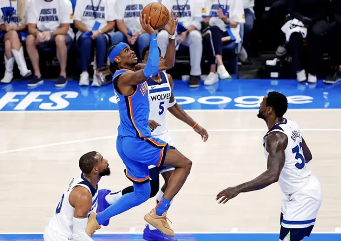Oklahoma City Thunder guard Shai Gilgeous-Alexander (2) shoots the ball against Minnesota Timberwolves guard Mike Conley (10) during the first quarter in game five of the western conference finals for the 2025 NBA Playoffs at Paycom Center. Mandatory Credit: Alonzo Adams-Imagn Images