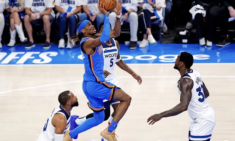 Oklahoma City Thunder guard Shai Gilgeous-Alexander (2) shoots the ball against Minnesota Timberwolves guard Mike Conley (10) during the first quarter in game five of the western conference finals for the 2025 NBA Playoffs at Paycom Center. Mandatory Credit: Alonzo Adams-Imagn Images