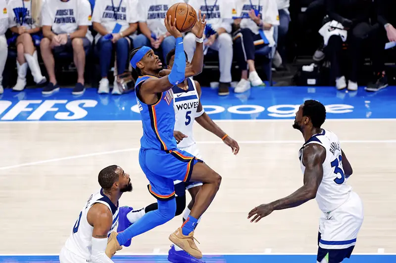 Oklahoma City Thunder guard Shai Gilgeous-Alexander (2) shoots the ball against Minnesota Timberwolves guard Mike Conley (10) during the first quarter in game five of the western conference finals for the 2025 NBA Playoffs at Paycom Center. Mandatory Credit: Alonzo Adams-Imagn Images