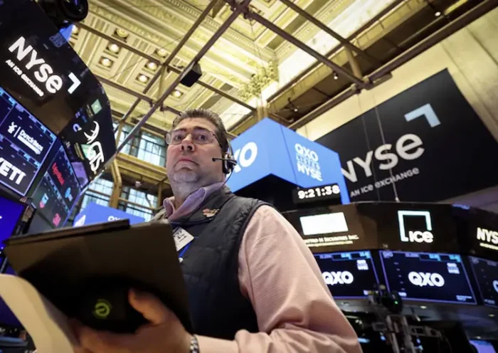A trader works on the floor at the New York Stock Exchange (NYSE) in New York City, U.S., April 30, 2025. REUTERS/Brendan McDermid