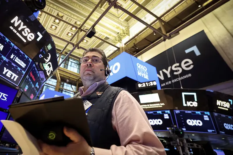 A trader works on the floor at the New York Stock Exchange (NYSE) in New York City, U.S., April 30, 2025. REUTERS/Brendan McDermid